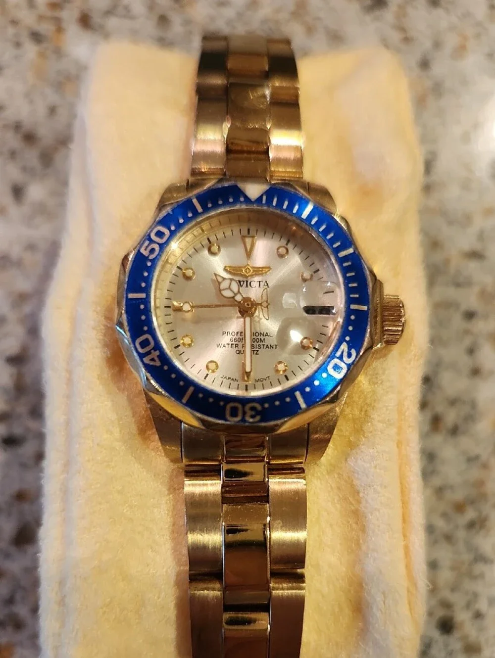 Invicta Gold-Tone Watch with Blue Bezel